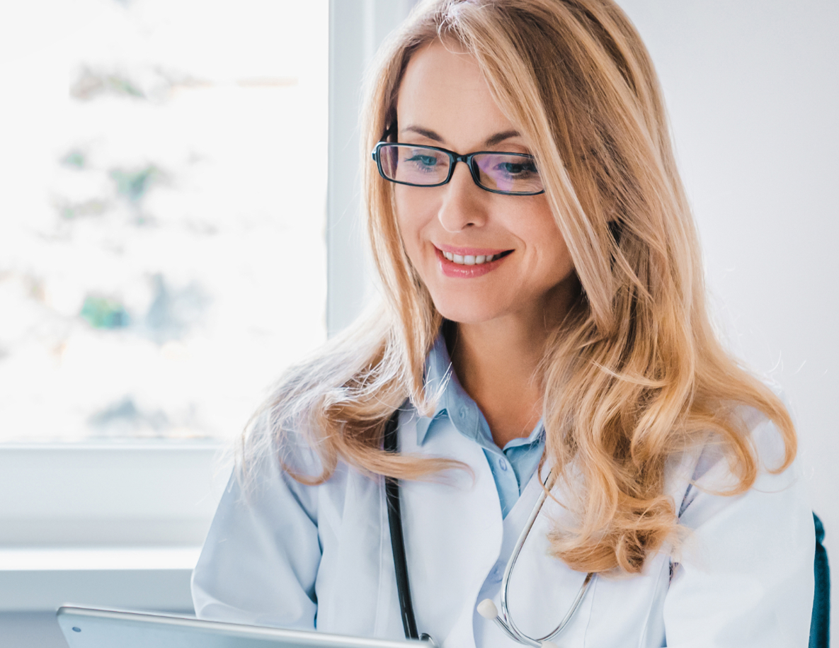 Female doctor holding a tablet