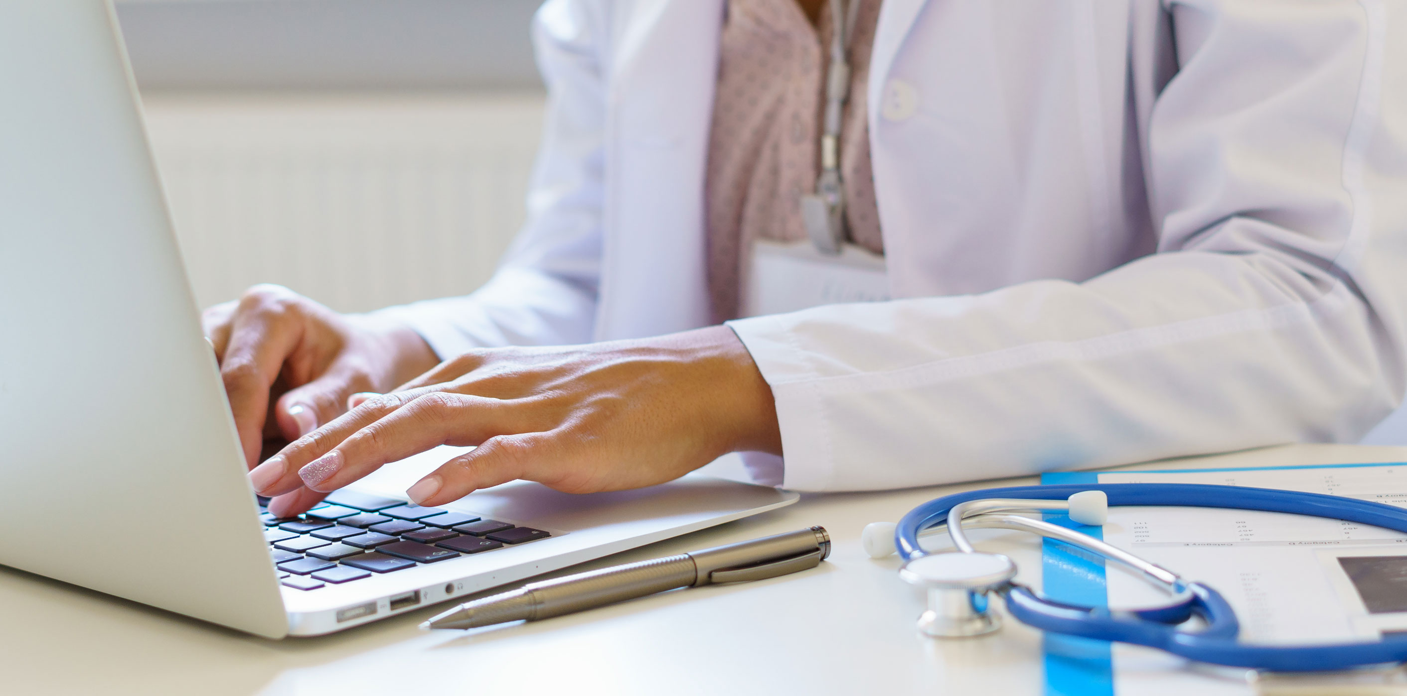 doctor-working-on-laptop